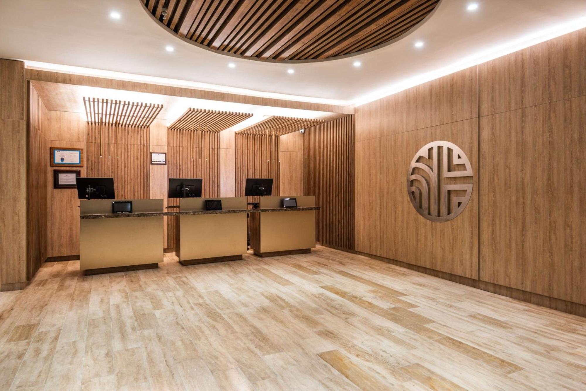 Отель Nh Collection Bogota Wtc Royal Экстерьер фото Reception
