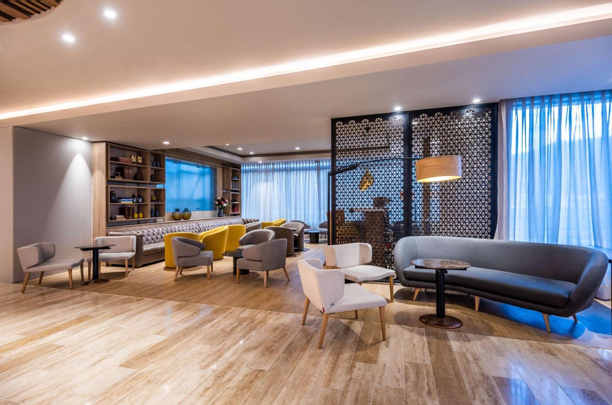 Отель Nh Collection Bogota Wtc Royal Экстерьер фото The lounge at the airport